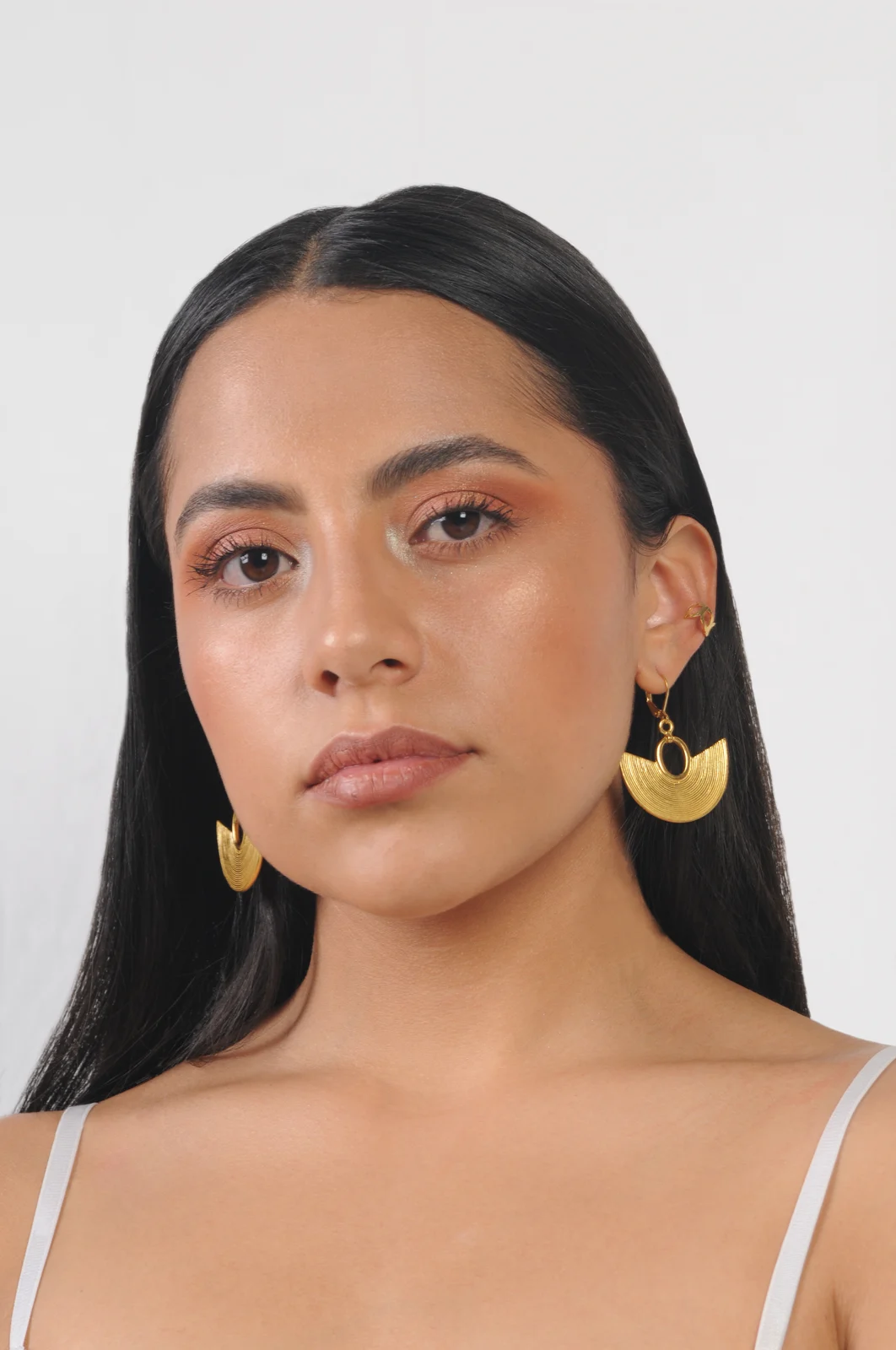 Model wearing Blum Art jewelry